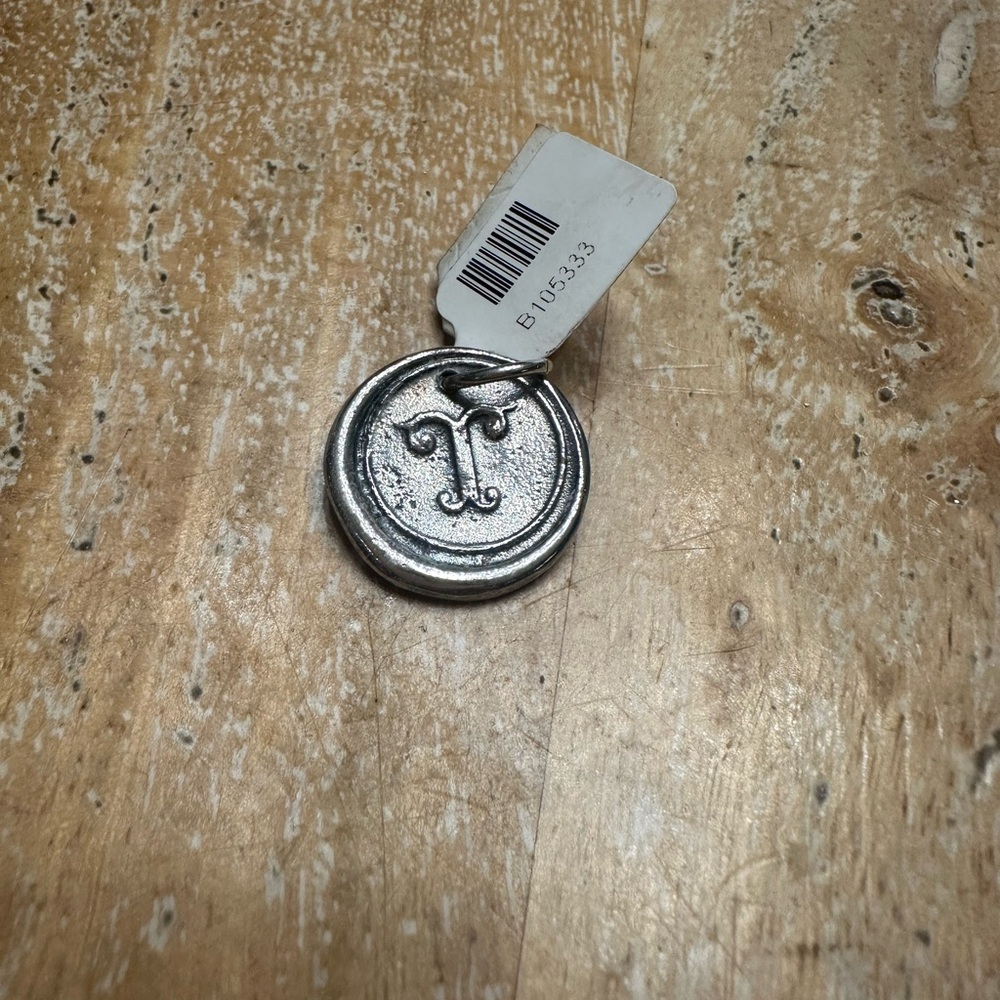 Waxing Poetic Sterling Silver letter T pendant for your necklace.